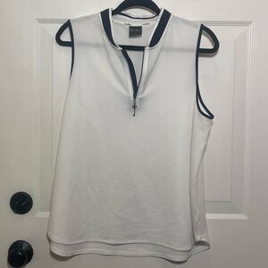 White Sleeveless Belyn Key Golf Top With Navy Trim